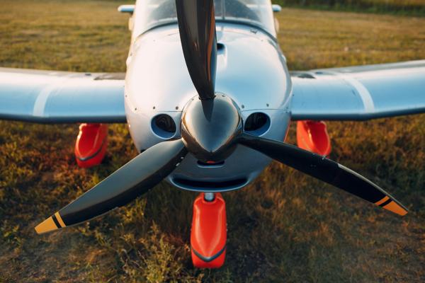 A method of sizing an engine and propeller for a light sport aircraft is described and thrust curves plotted to determine maximum theoretical speed.